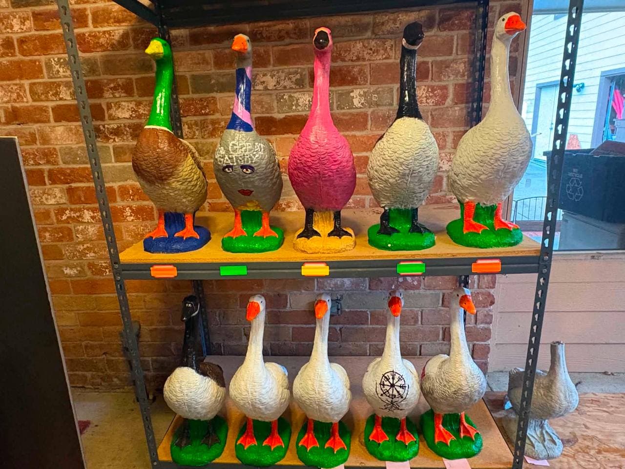 Five geese showing the range of custom paint options