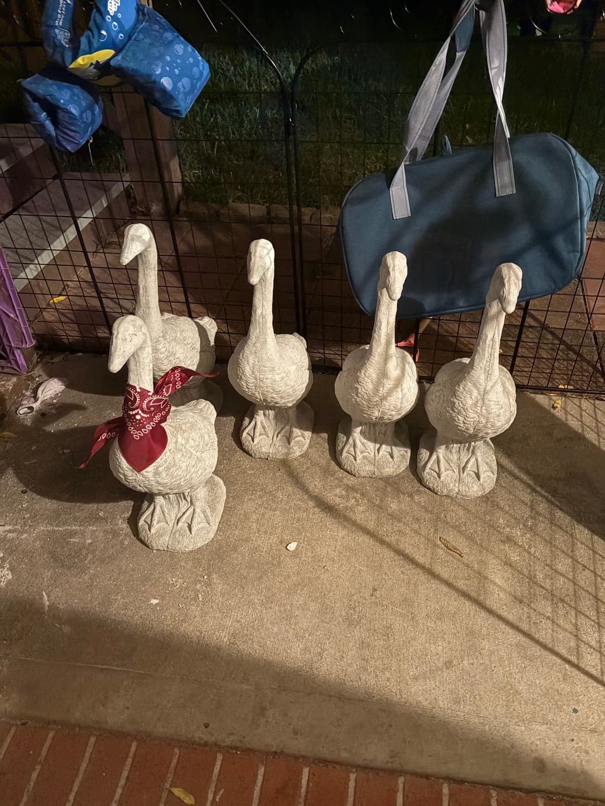 Gelso's Geese — hand-crafted concrete porch geese